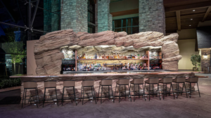 a bar with a rocky mountain framing 